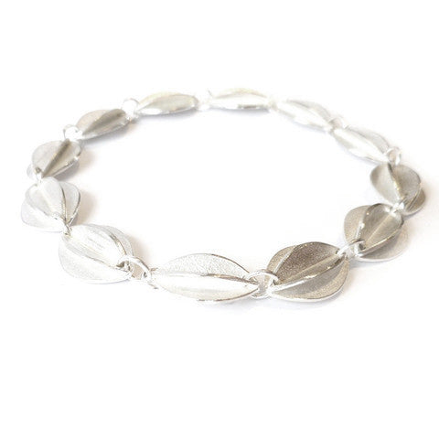 Contemporary sterling silver bracelet, leaf shape, handmade and bespoke by Sue Lane Jewellery. Perfect for Silver wedding anniversary, 21st birthday present