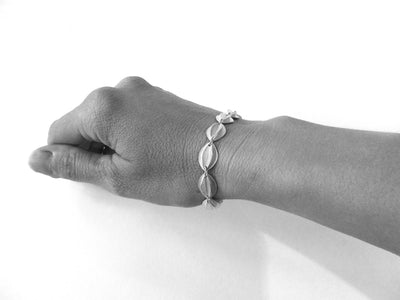 Contemporary sterling silver bracelet, leaf shape, handmade and bespoke by Sue Lane Jewellery. Perfect for Silver wedding anniversary, 21st birthday present